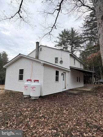 a front view of house with yard