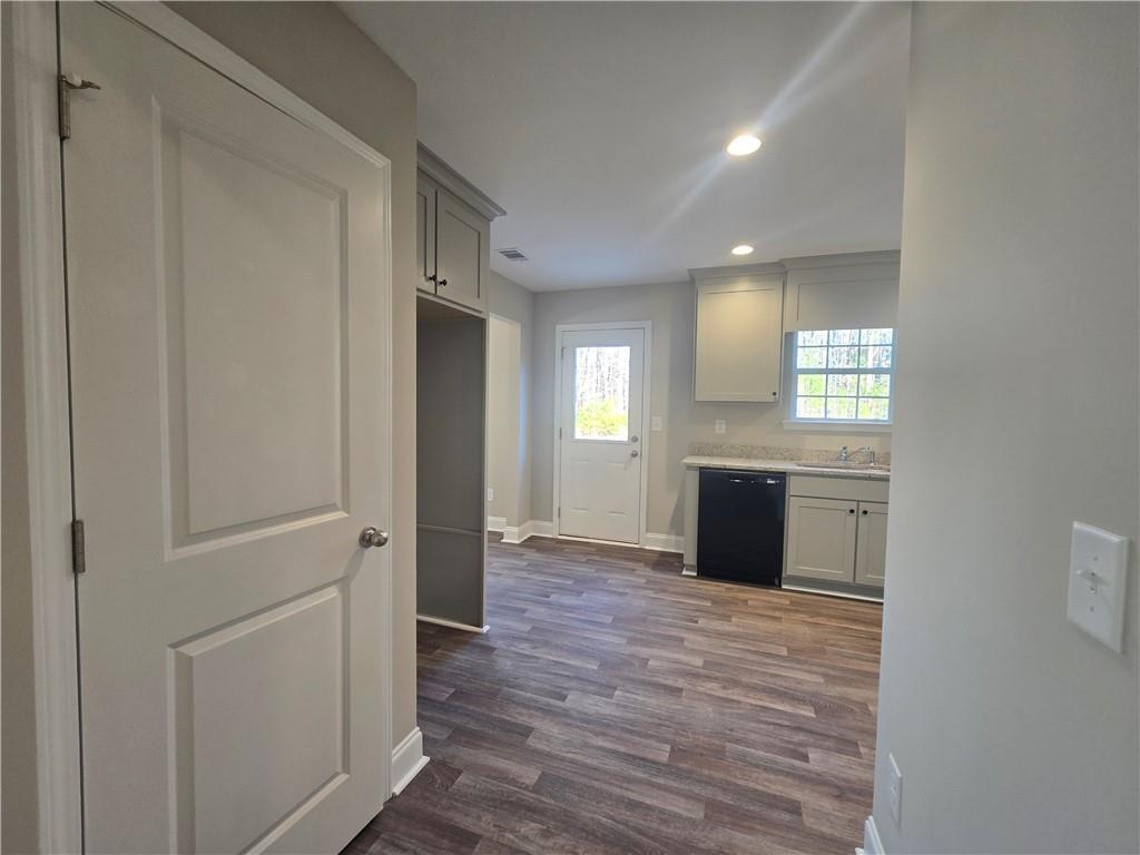 2970 Cannon Bridge Road Demorest, GA 30535 - Photo 15 of 36 a view of a big room with wooden floor and windows