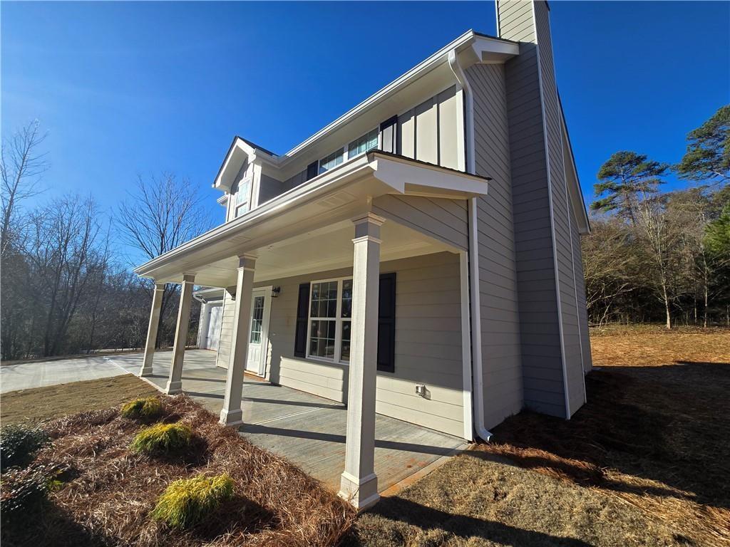 2970 Cannon Bridge Road Demorest, GA 30535 - Photo 2 of 36 a front view of a house with garden