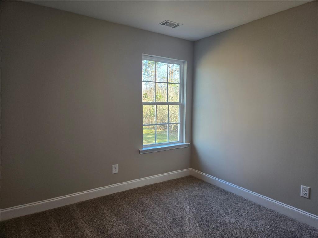 2970 Cannon Bridge Road Demorest, GA 30535 - Photo 32 of 36 an empty room with a window