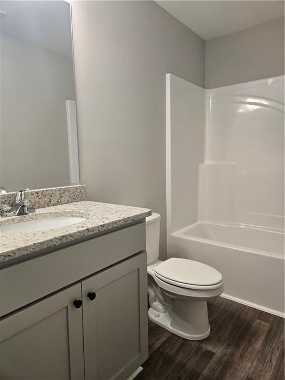 2970 Cannon Bridge Road Demorest, GA 30535 - Photo 34 of 36 a bathroom with a granite countertop sink toilet and shower