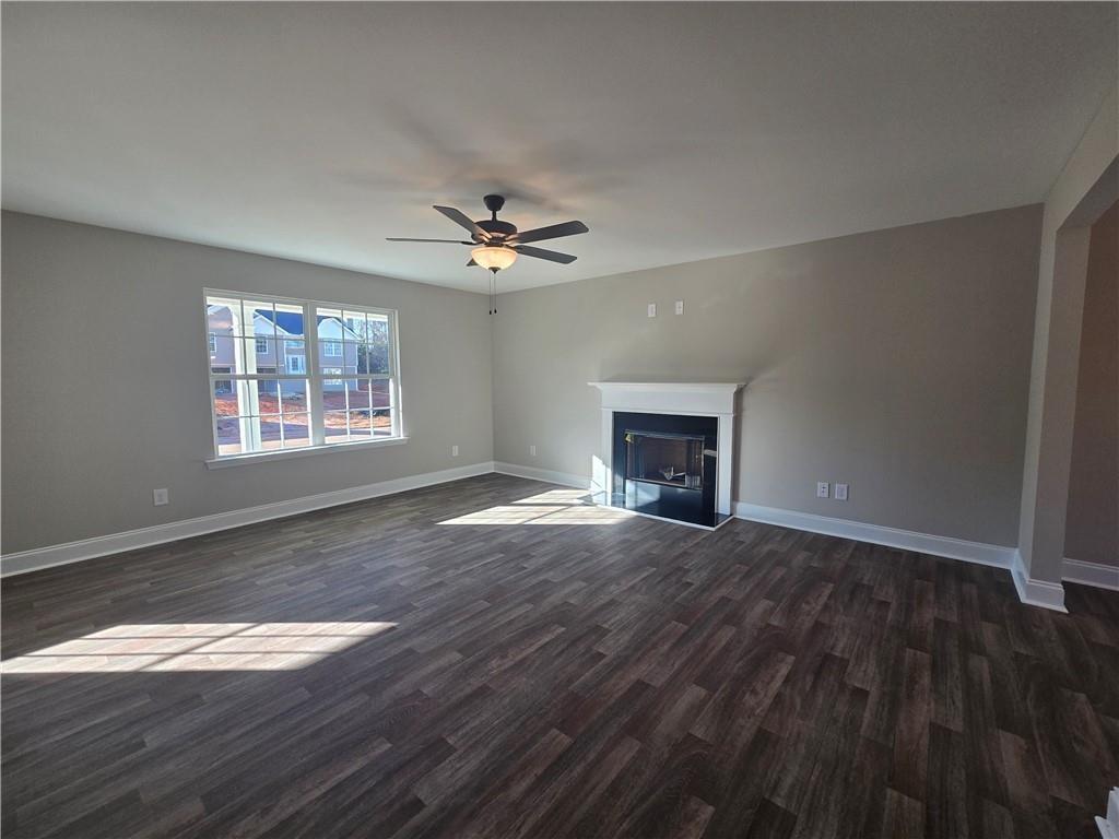 2970 Cannon Bridge Road Demorest, GA 30535 - Photo 4 of 36 a view of an empty room with wooden floor and a window