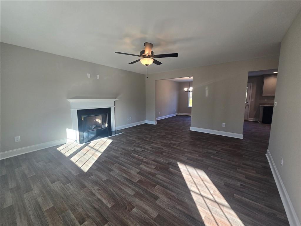 2970 Cannon Bridge Road Demorest, GA 30535 - Photo 5 of 36 wooden floor in an empty room with a fireplace