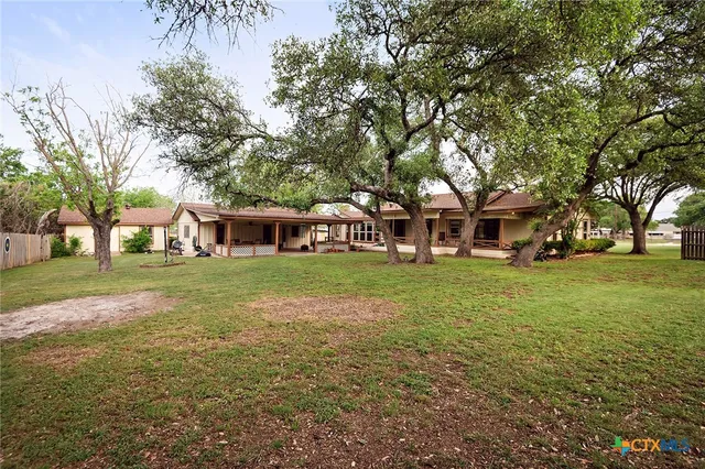 a view of swimming pool with a garden