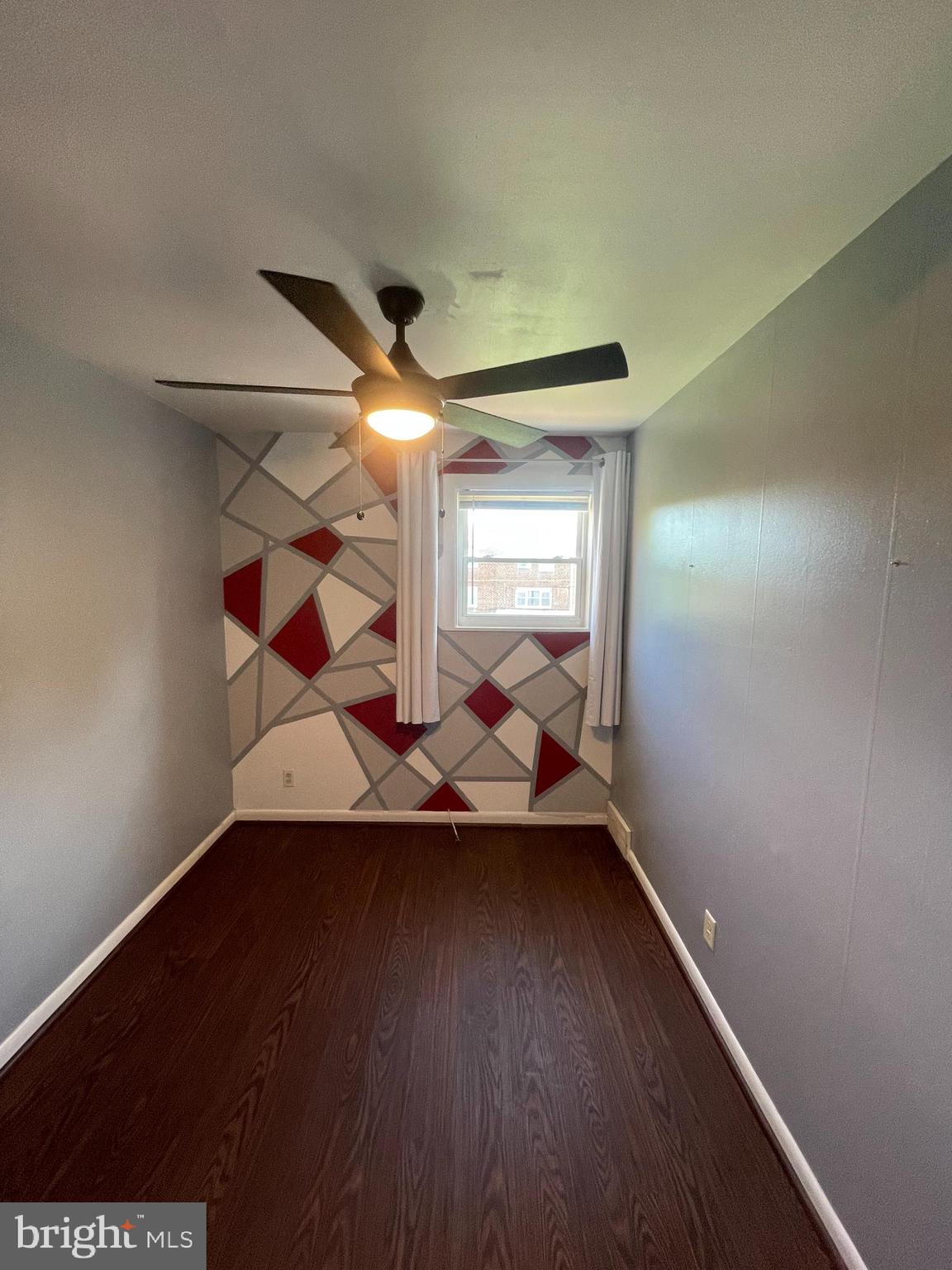 3349 Fairdale Road Philadelphia, PA 19154 - Photo 6 of 20 an empty room with wooden floor and windows