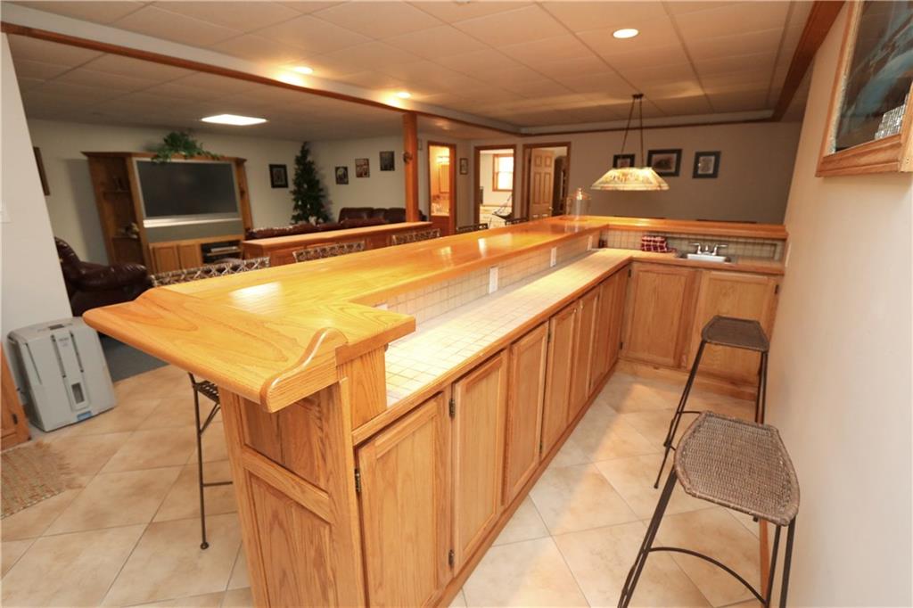 2143 Prospect Road Prospect, PA 16052 - Photo 19 of 25 11' hand crafted raised panel oak bar