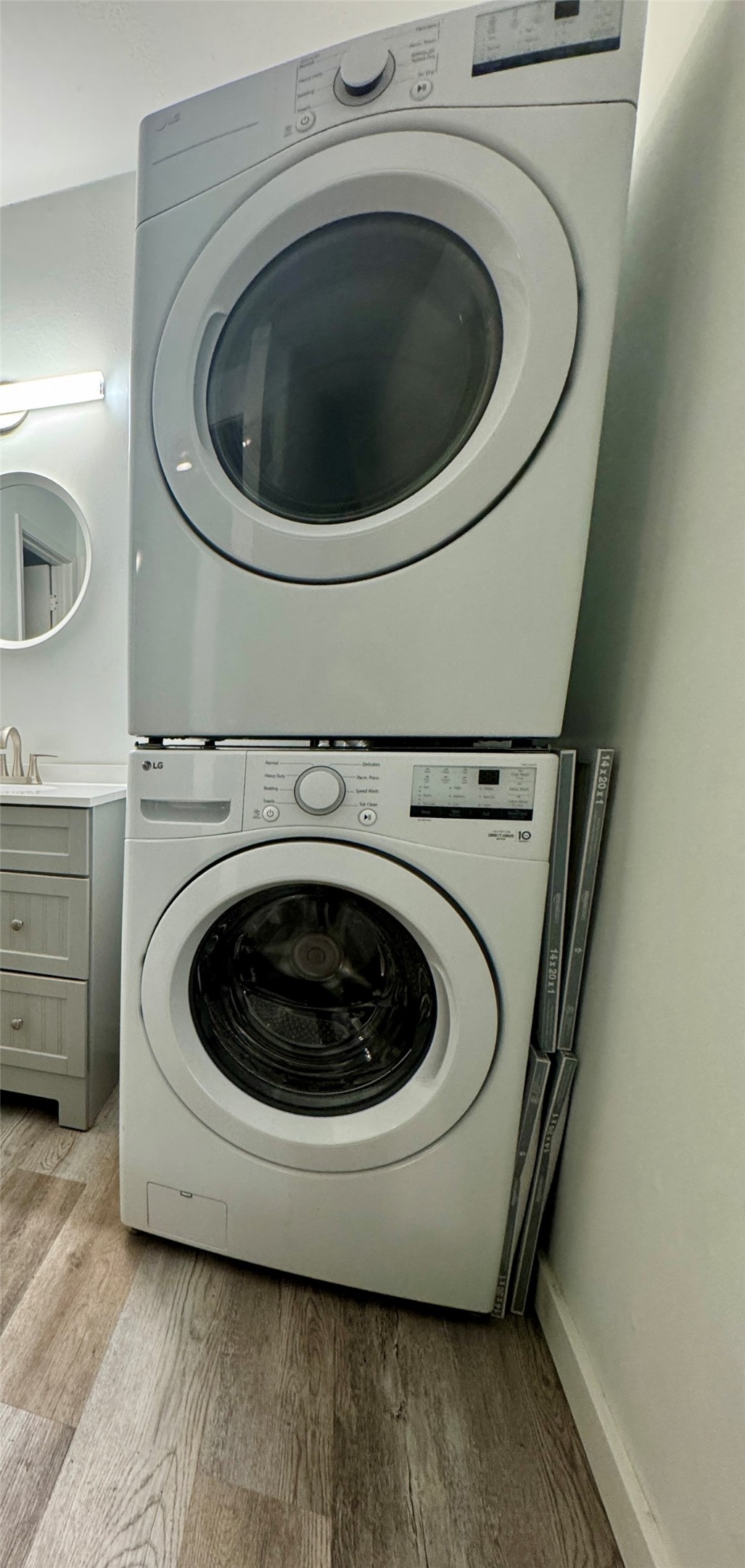 1714 Enfield Road, Unit 102 Austin, TX 78703 - Photo 12 of 15 A convenient stacked washer and dryer unit provides efficient laundry care.