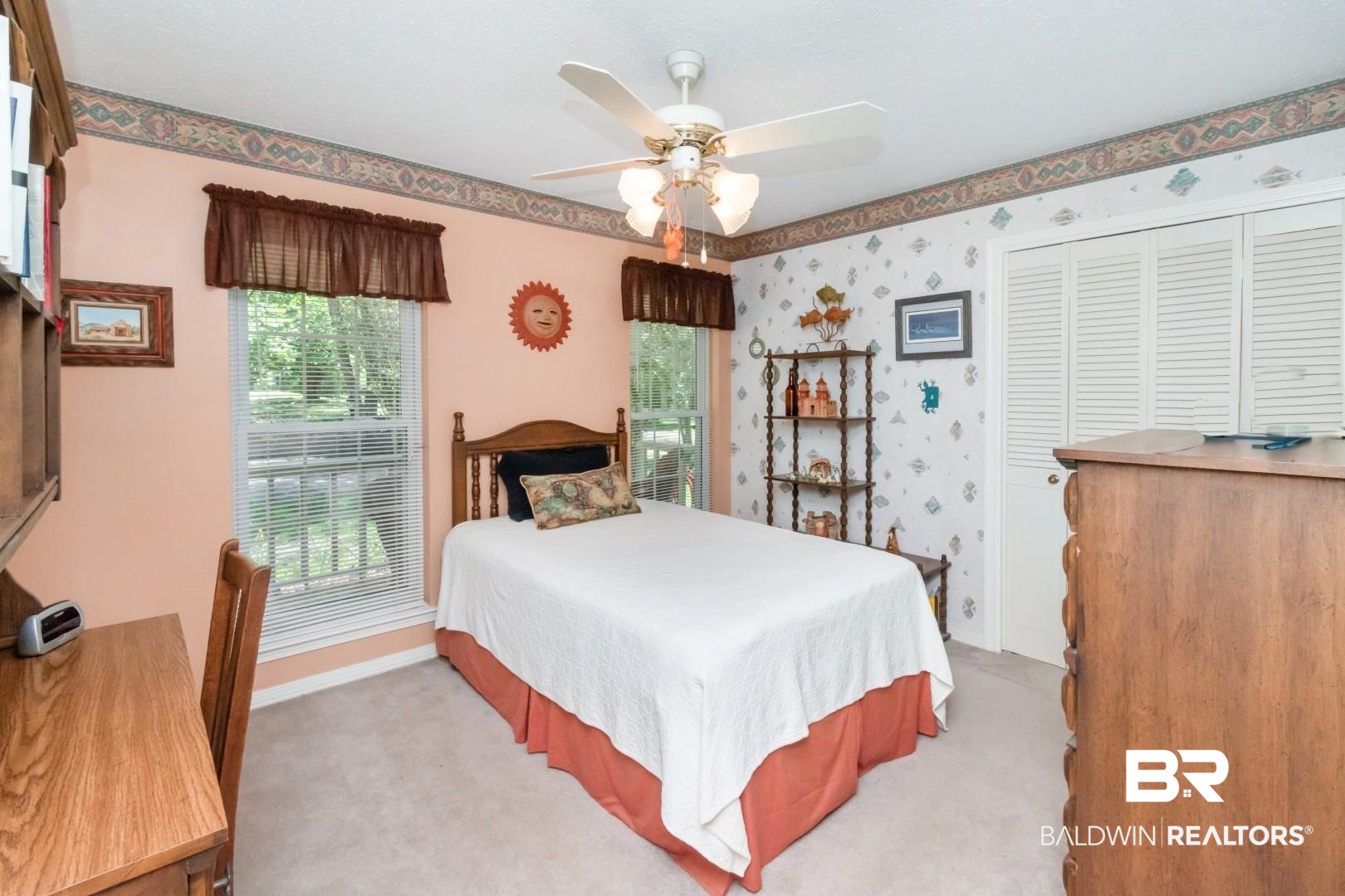 8220 Fordham Road Mobile, AL 36619 - Photo 18 of 41 Bedroom with light colored carpet, baseboards, ceiling fan, and a closet