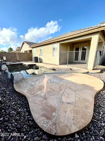 a view of a house with a swimming pool