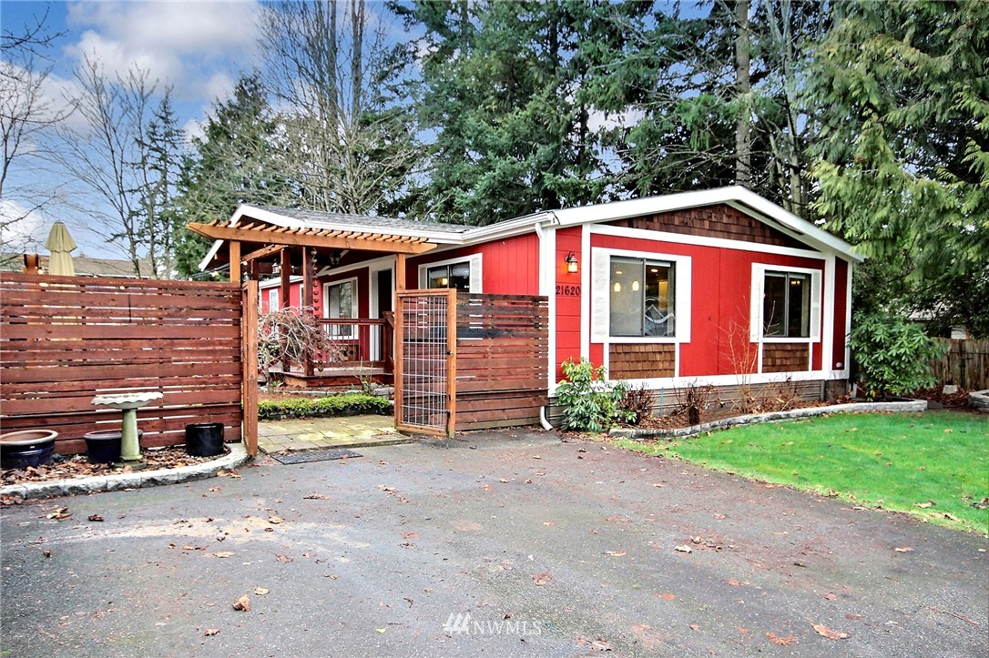 21620 8th Place West Bothell, WA 98021 - Photo 1 of 1 a front view of a house with garden