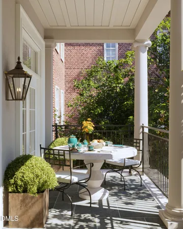 a outdoor living space with furniture and a potted plant