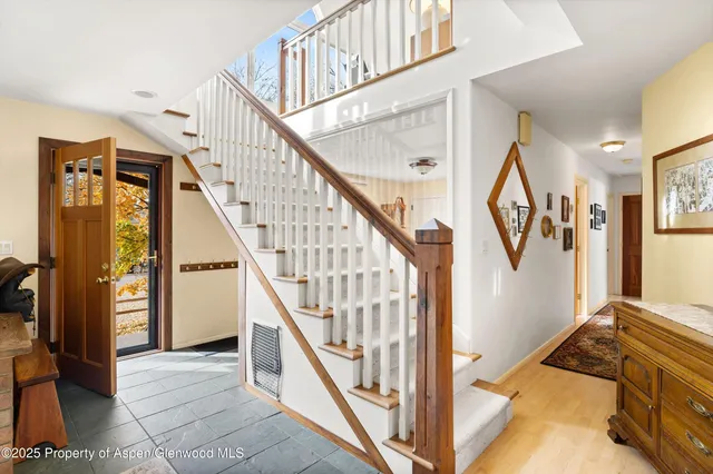 a view of an entryway with staircase