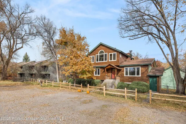 front view of a house with a street