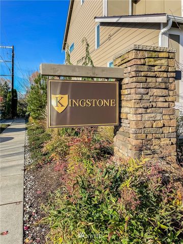 a sign broad in front of a building