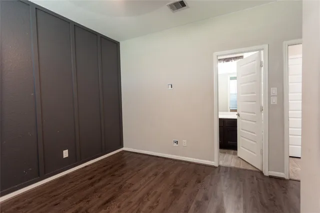 wooden floor and windows in a room