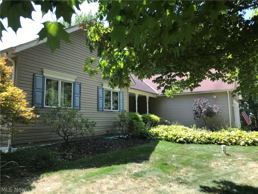 13393 Radcliffe Road Chardon, OH 44024 - Photo 24 of 35 Tons of perennials: rhododendrons, azaleas, hostas, day lilies! Something always blooming!!