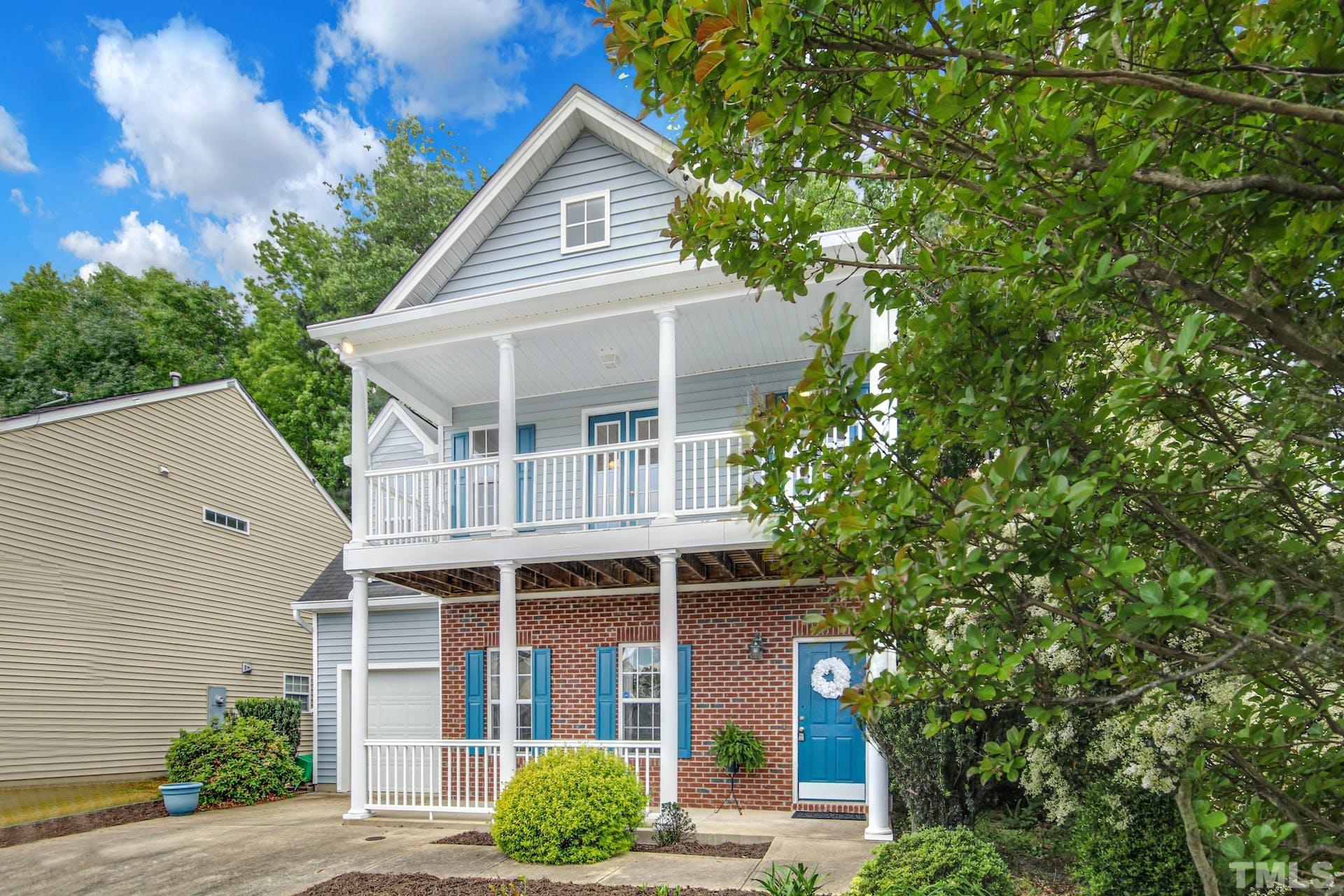 5852 Wynmore Road Raleigh, NC 27610 - Photo 3 of 25 a view of a house with a yard
