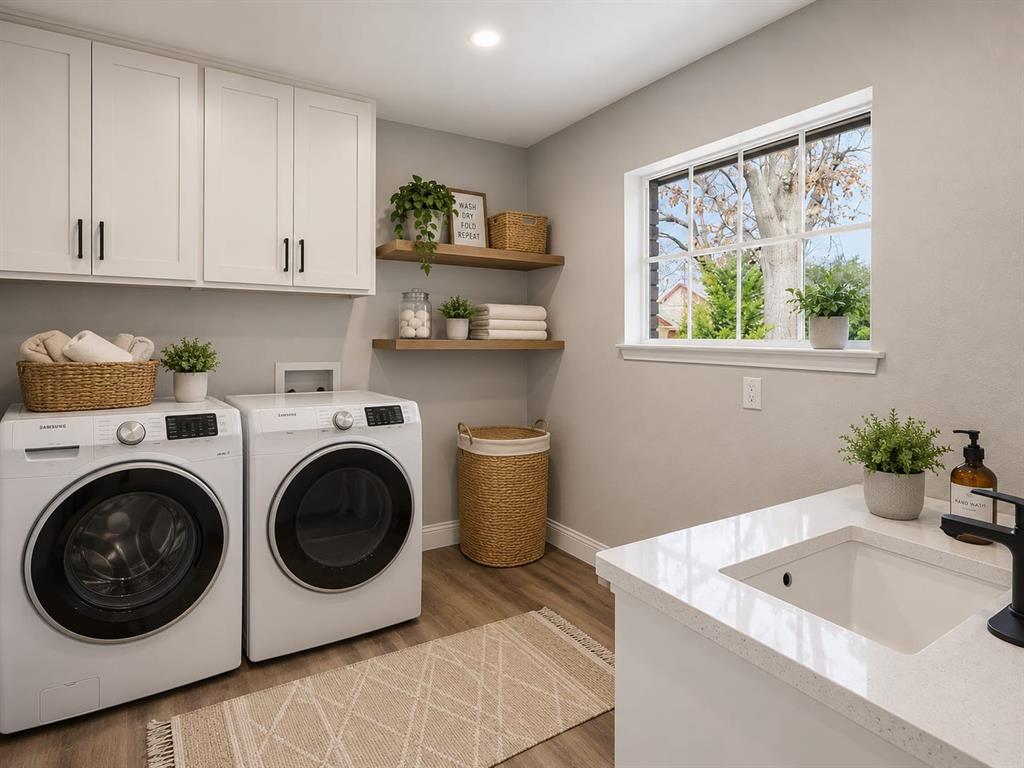 1708 Park Ridge Terrace Arlington, TX 76012 - Photo 36 of 37 Laundry space featuring white shaker-style cabinetry, wood-finish flooring, a white-framed window, floating wood shelves, and a utility sink with a black faucet