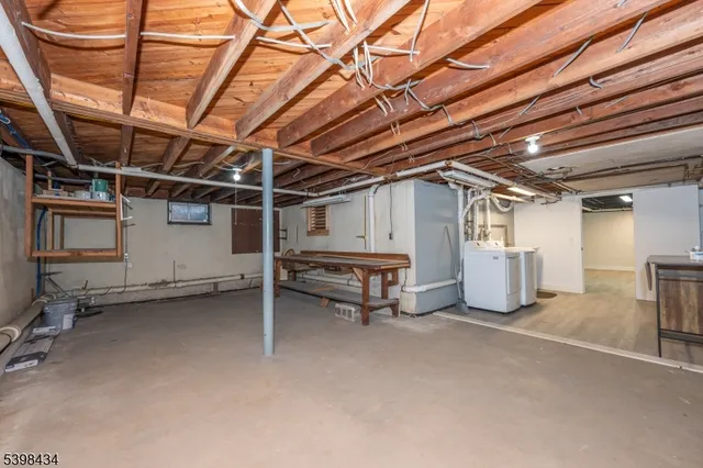 a view of a room with wooden walls