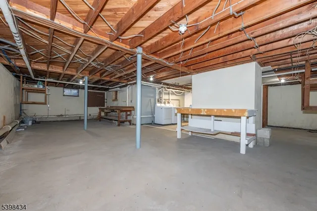 a view of a room with wooden walls