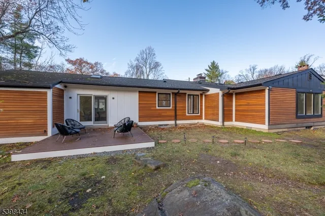 a front view of a house with patio