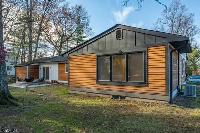 a front view of a house with yard