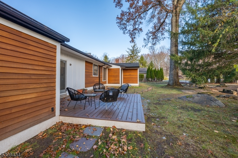 7 Oak Tree Lane Little Falls, NJ 07424 - Photo 44 of 46 a view of backyard with seating space and trees