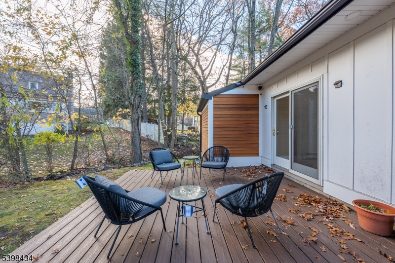 7 Oak Tree Lane Little Falls, NJ 07424 - Photo 46 of 46 a view of a roof deck with furniture