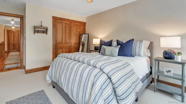 a bedroom with a bed and a cabinets