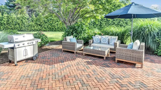 a backyard of a house with seating space