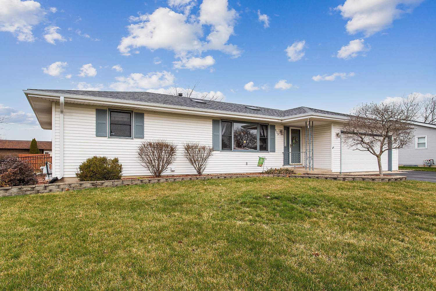 929 South Bentley Road New Lenox, IL 60451 - Photo 18 of 18 a front view of a house with a yard