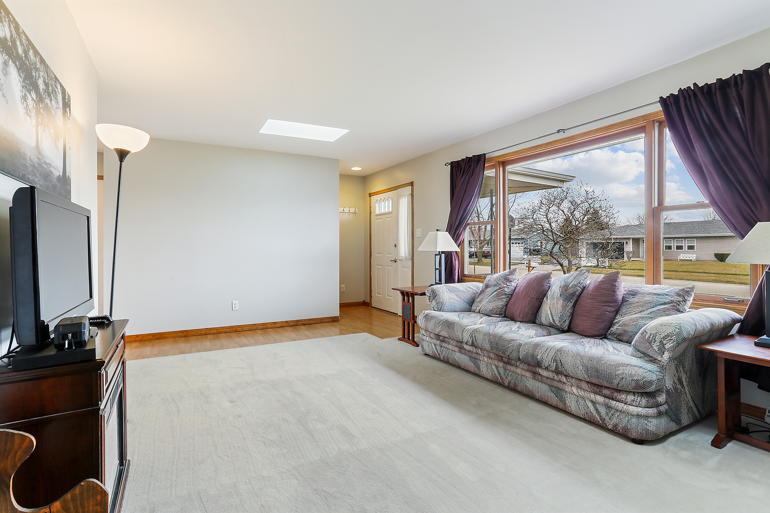 929 South Bentley Road New Lenox, IL 60451 - Photo 2 of 18 a living room with furniture and a flat screen tv