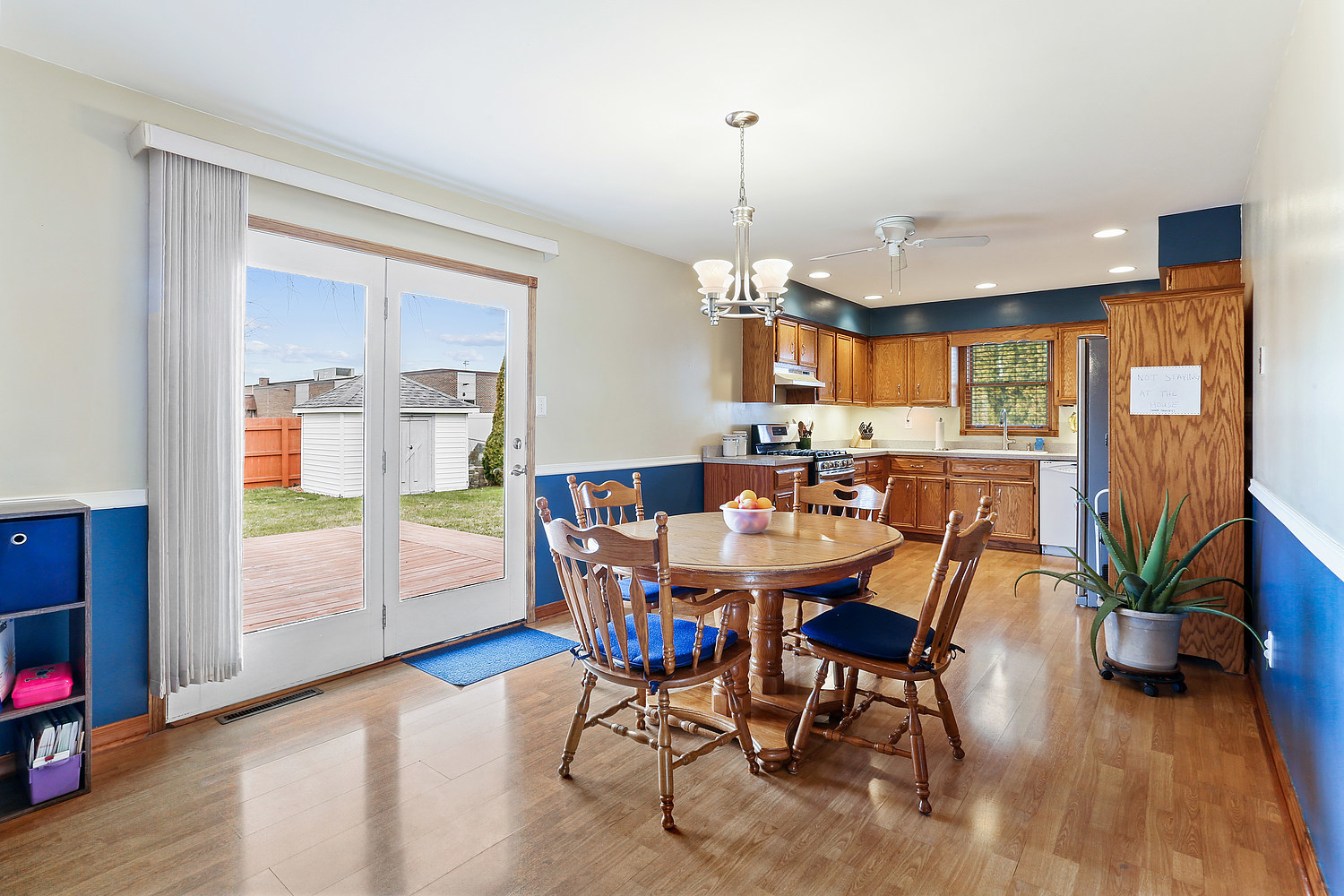 929 South Bentley Road New Lenox, IL 60451 - Photo 4 of 18 a view of a dining room with furniture window and wooden floor