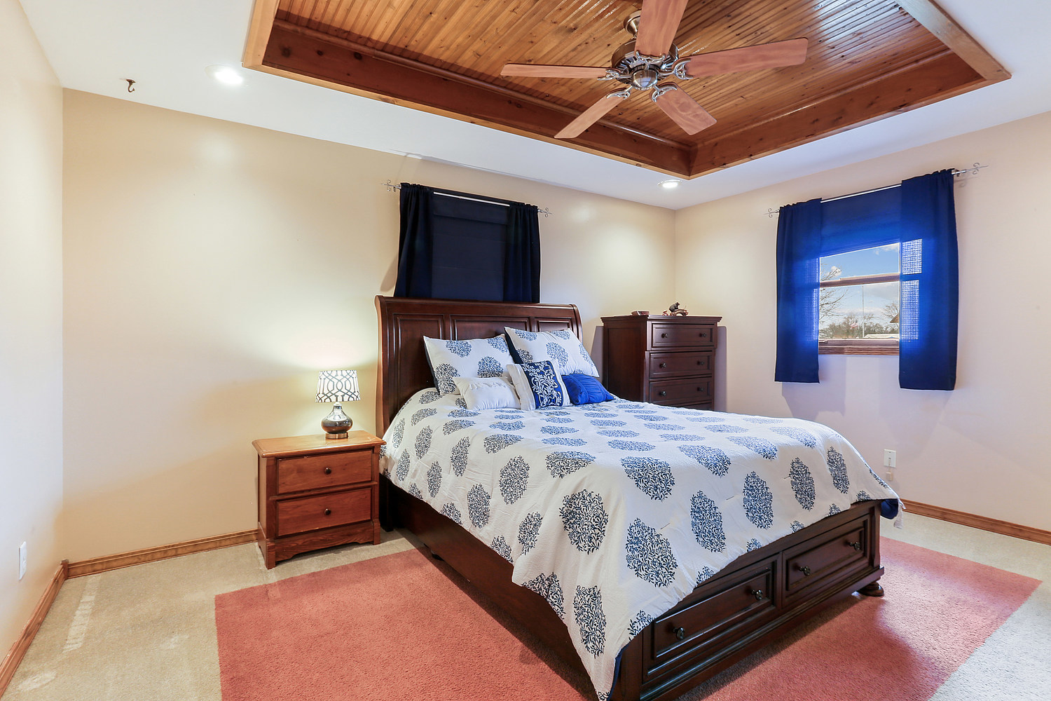 929 South Bentley Road New Lenox, IL 60451 - Photo 7 of 18 a bedroom with a bed and dresser with mirror