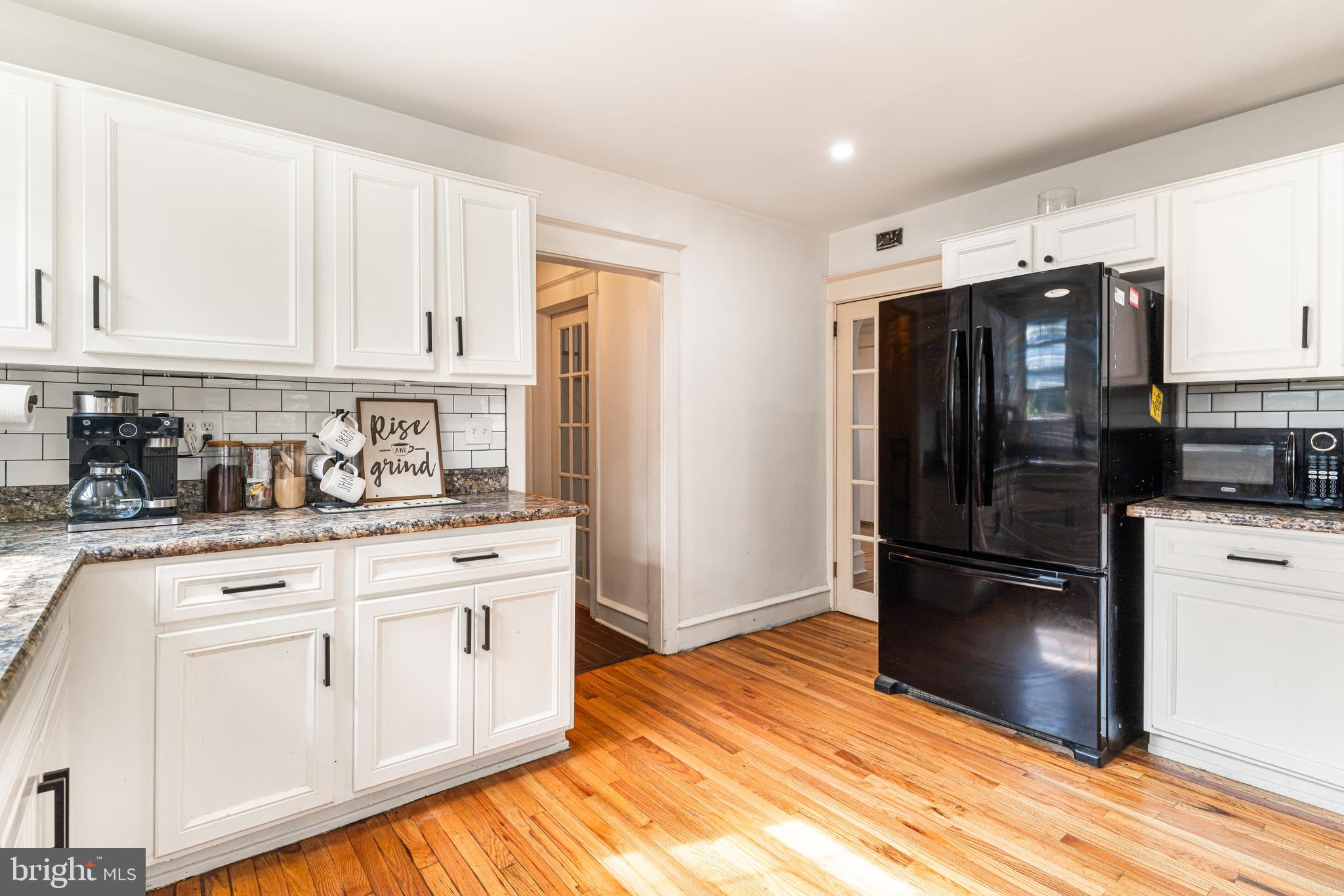 203 Hewett Road Wyncote, PA 19095 - Photo 7 of 47 Bright kitchen with rear‑yard access