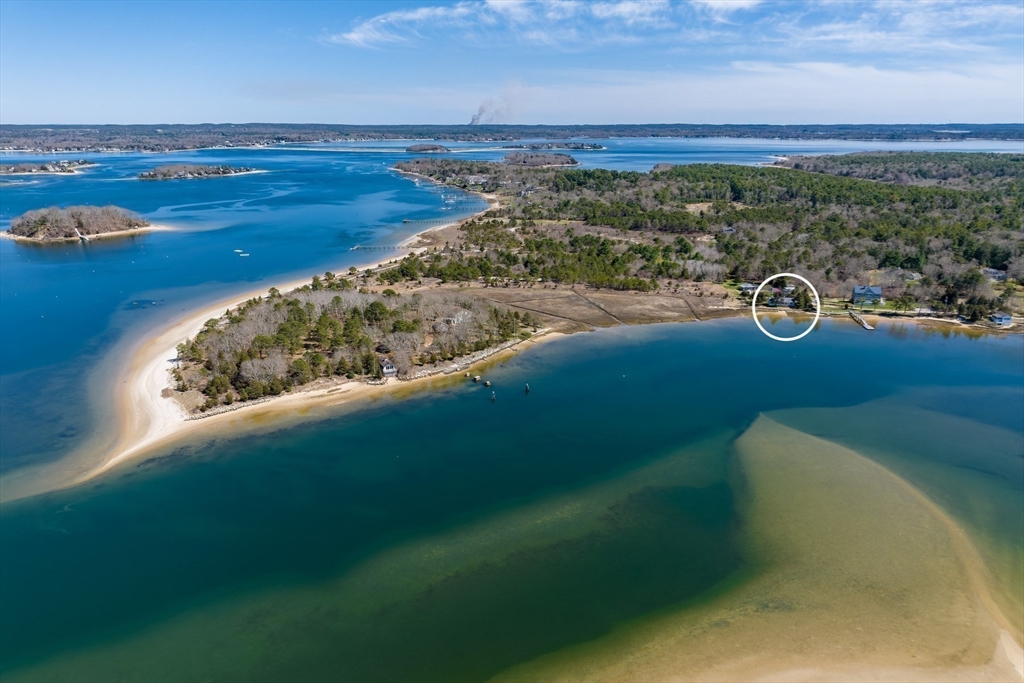30 Lydias Island Road Wareham, MA 02571 - Photo 16 of 18 a view of a lake with a mountain