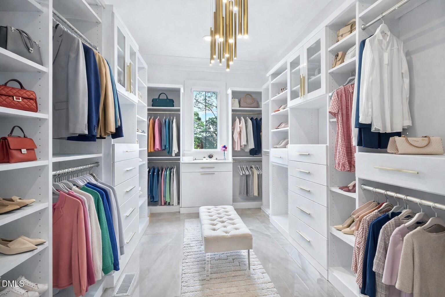 7017 Rainwater Road Raleigh, NC 27615 - Photo 27 of 70 Elegant walk-in closet with stylish acce