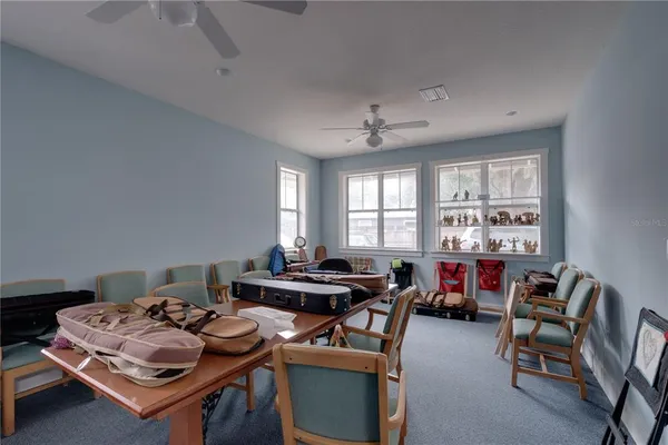 a view of a dining room with furniture