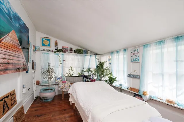 a bed room with a bed and a couch