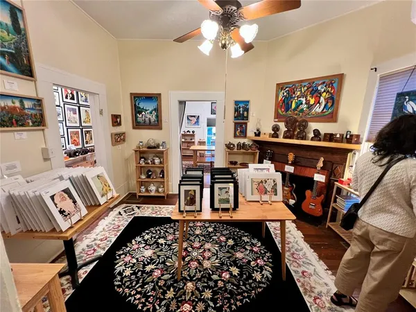 a bedroom with furniture and wooden floor