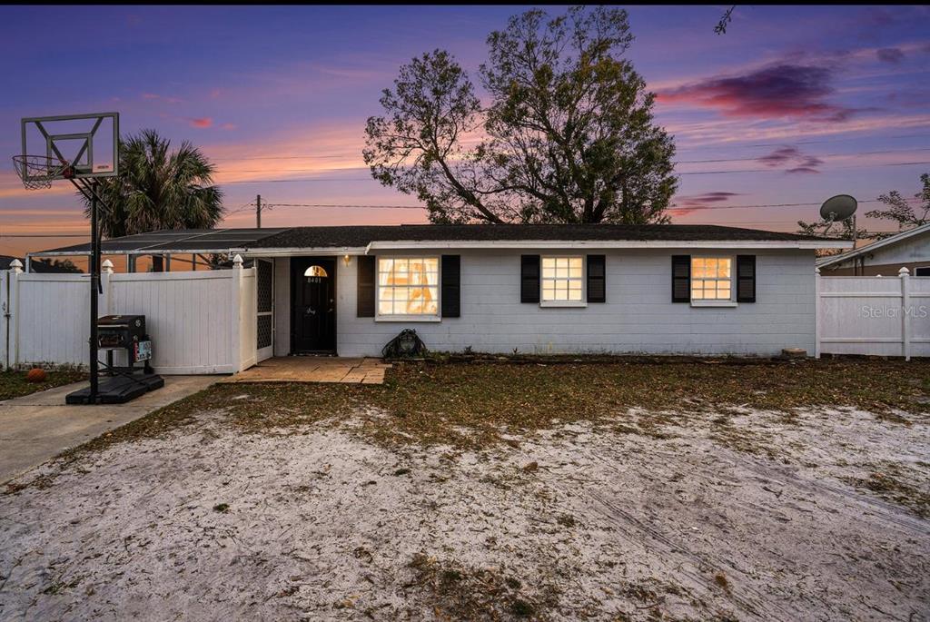 8401 Pinewood Street Tampa, FL 33615 - Photo 1 of 1 a view of a house with a yard