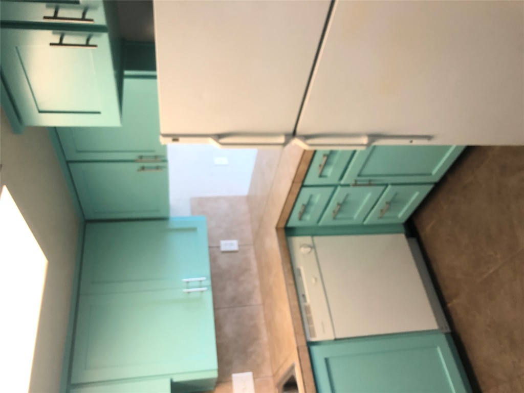 7302 Duval Street, Unit 141 Austin, TX 78752 - Photo 7 of 14 a utility room with dryer and washer