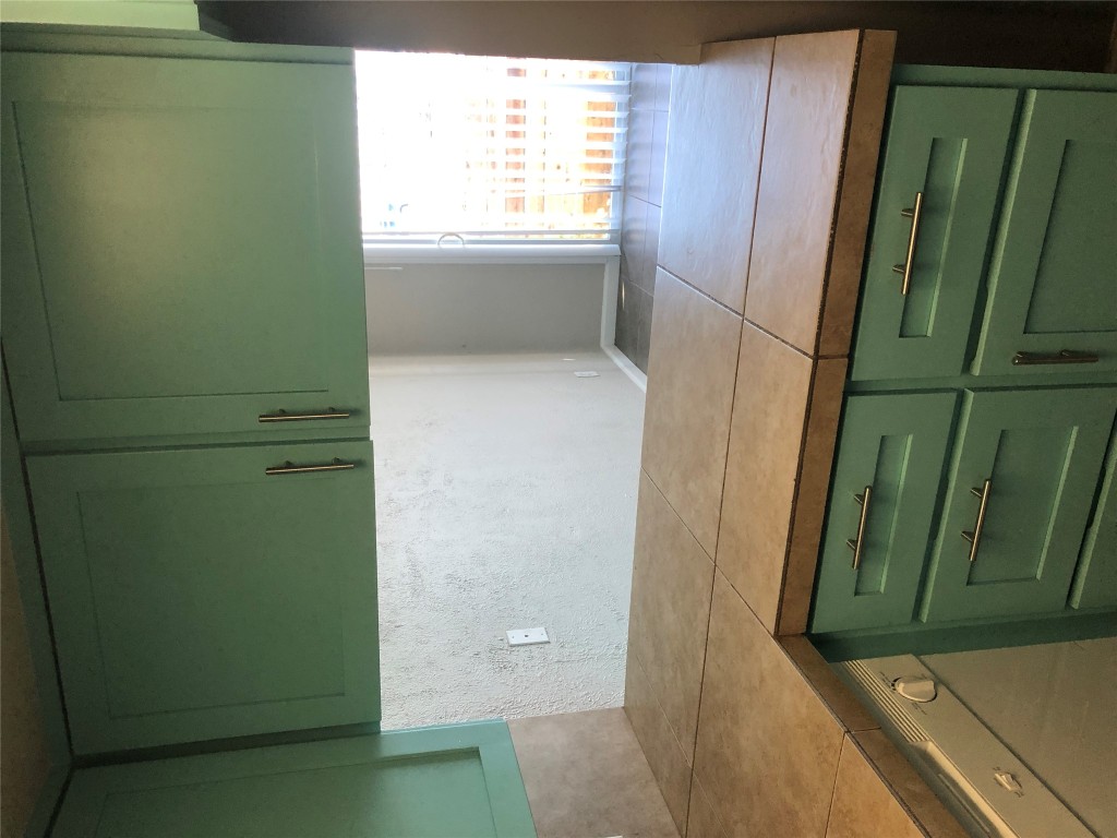 7302 Duval Street, Unit 141 Austin, TX 78752 - Photo 8 of 14 a view of wooden cabinets