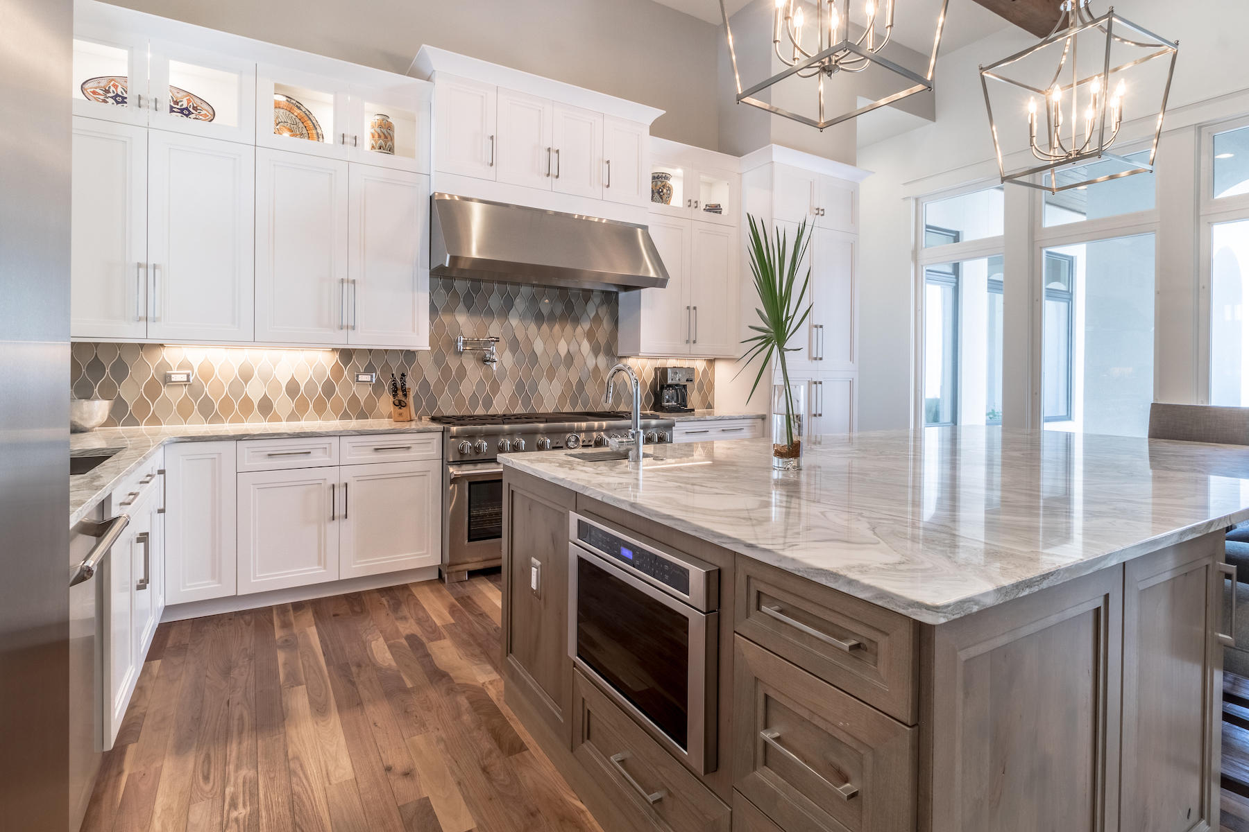 3522 Burnt Pine Lane Miramar Beach, FL 32550 - Photo 14 of 54 a kitchen with stainless steel appliances granite countertop a sink stove and cabinets