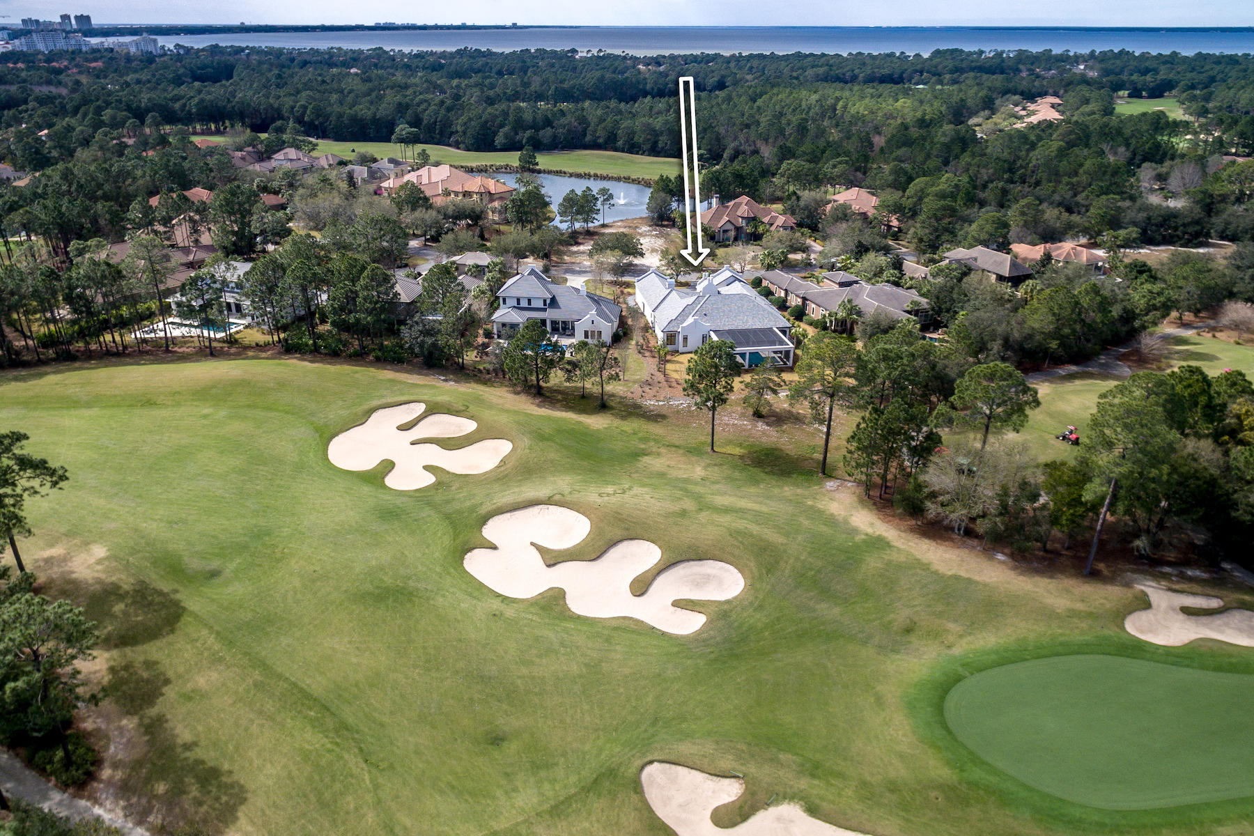 3522 Burnt Pine Lane Miramar Beach, FL 32550 - Photo 52 of 54 a view of a swimming pool with lawn chairs