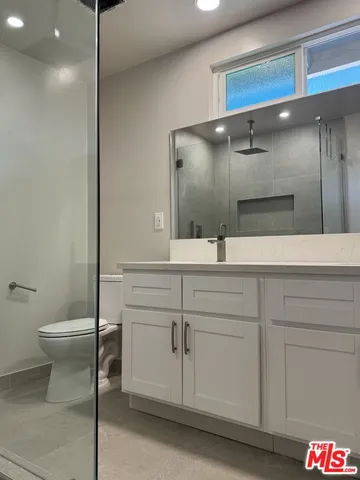 a bathroom with a sink and a toilet