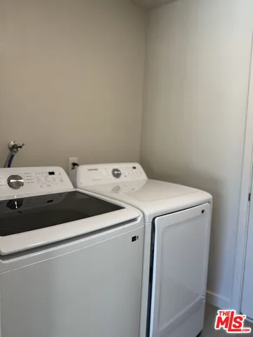 a empty closet with wooden floor