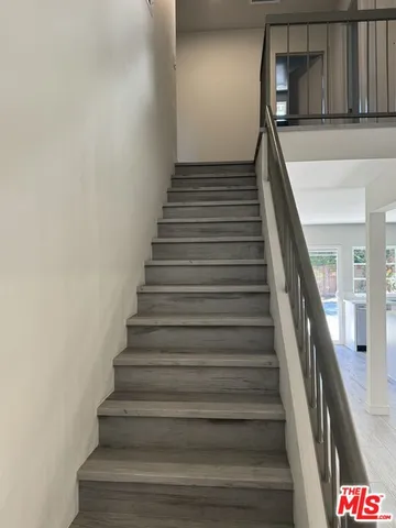 a view of a room that has a big window