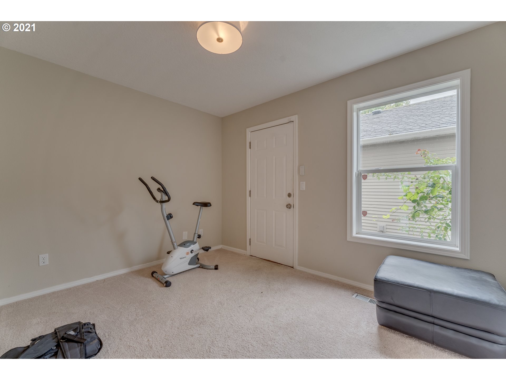 14134 East Burnside Street, Unit 4 Portland, OR 97233 - Photo 15 of 27 a view of room with a ceiling fan