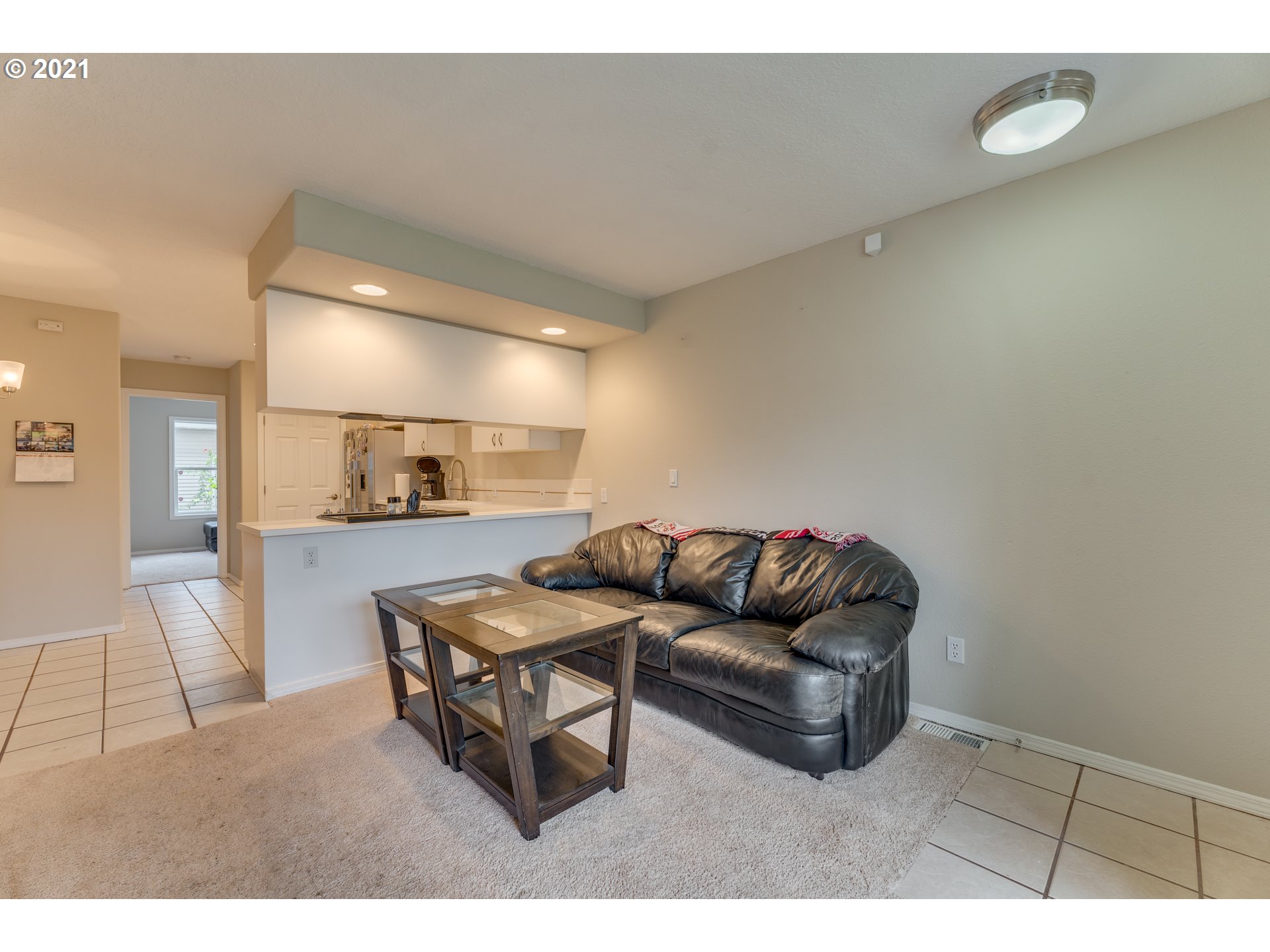 14134 East Burnside Street, Unit 4 Portland, OR 97233 - Photo 2 of 27 a living room with furniture and a wooden floor